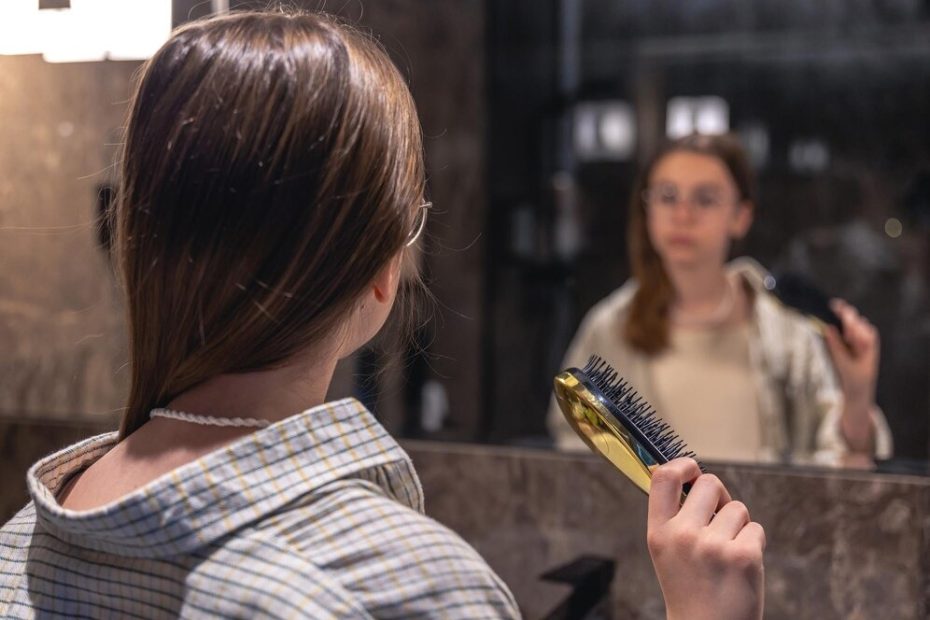 women-combing-wig-fitted-properly