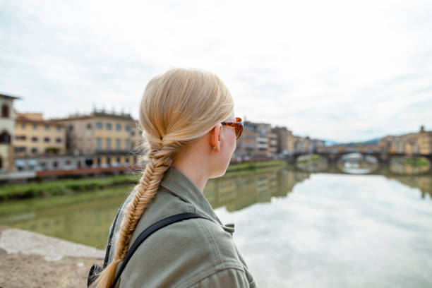 woman-with-fishtail-braid-on-a-bridge